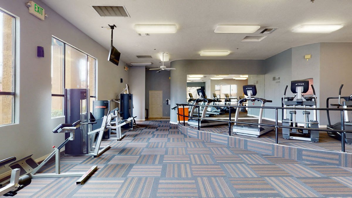 Arezzo Apartments- fitness center with equipment 