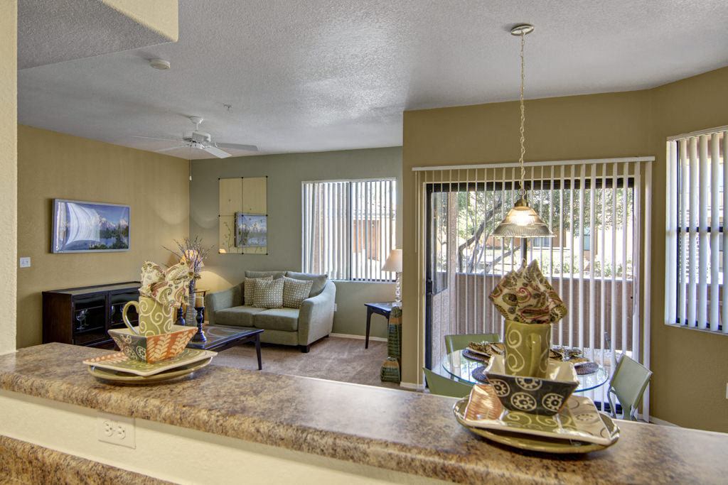 Arezzo Apartments - large windows with abundant natural light and sliding balcony door