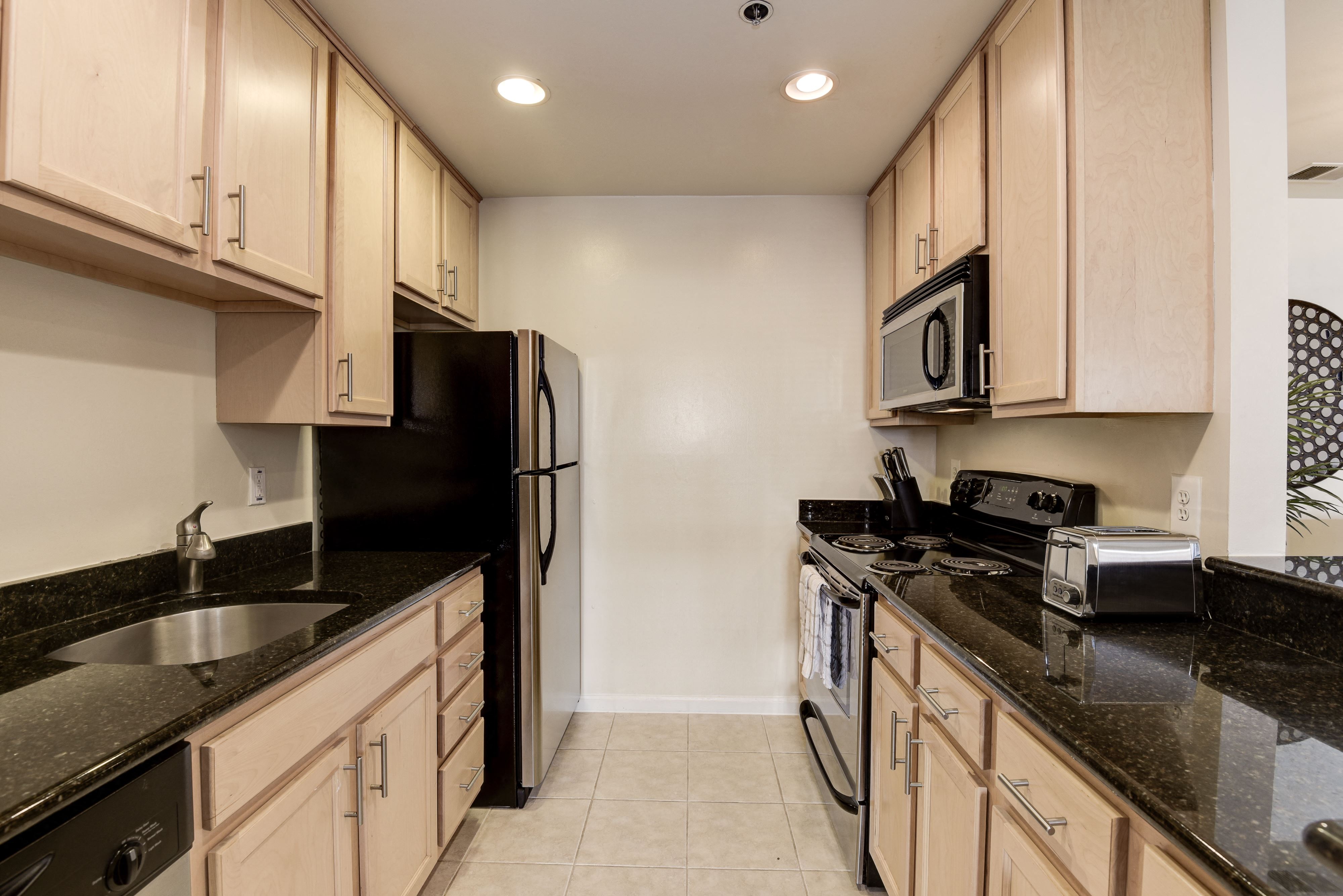 Fully equipped kitchens with recessed lighting
