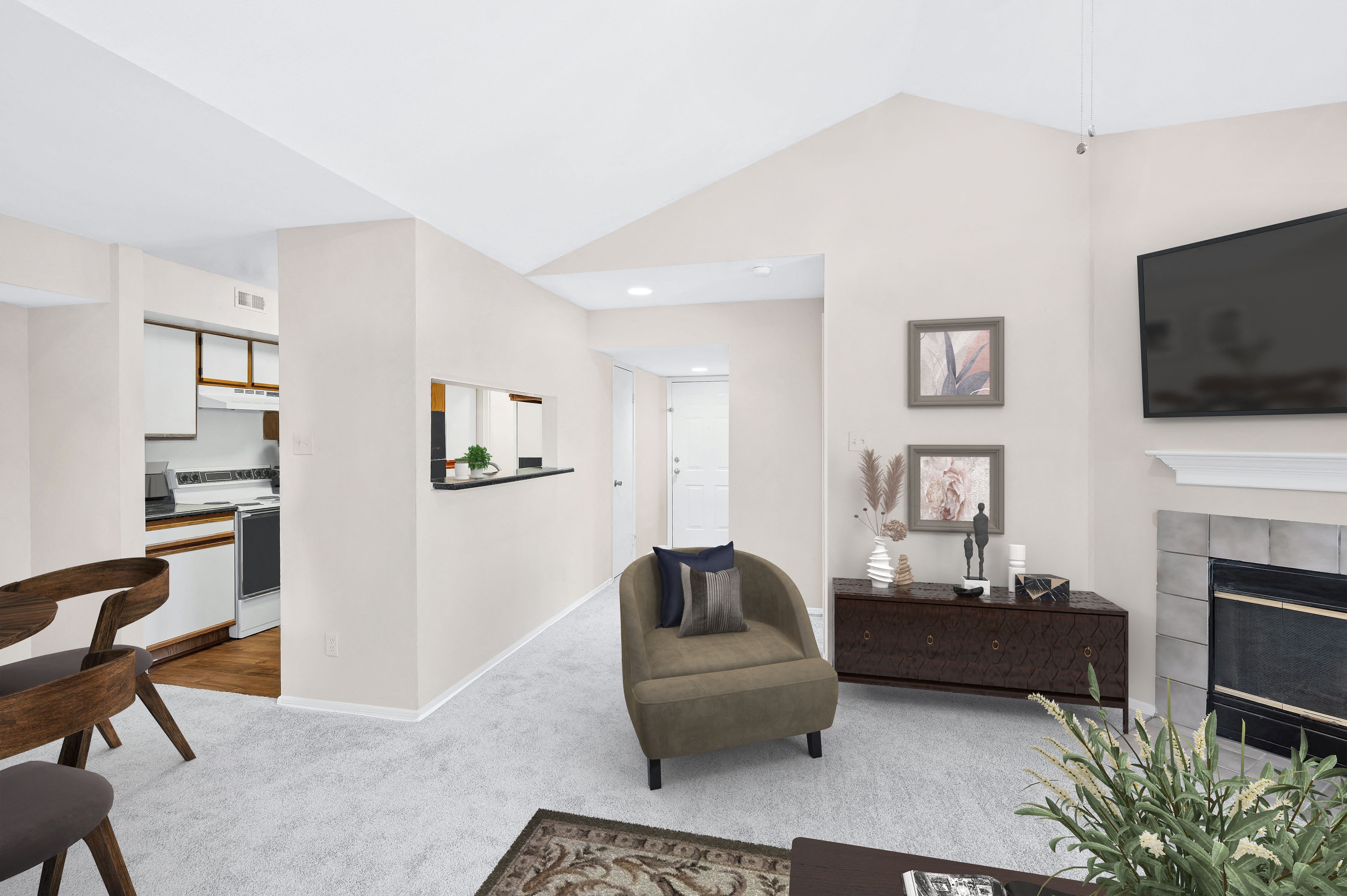 Living areas with plush carpet and wood-burning fireplace Living areas with plush carpet and wood-burning fireplace