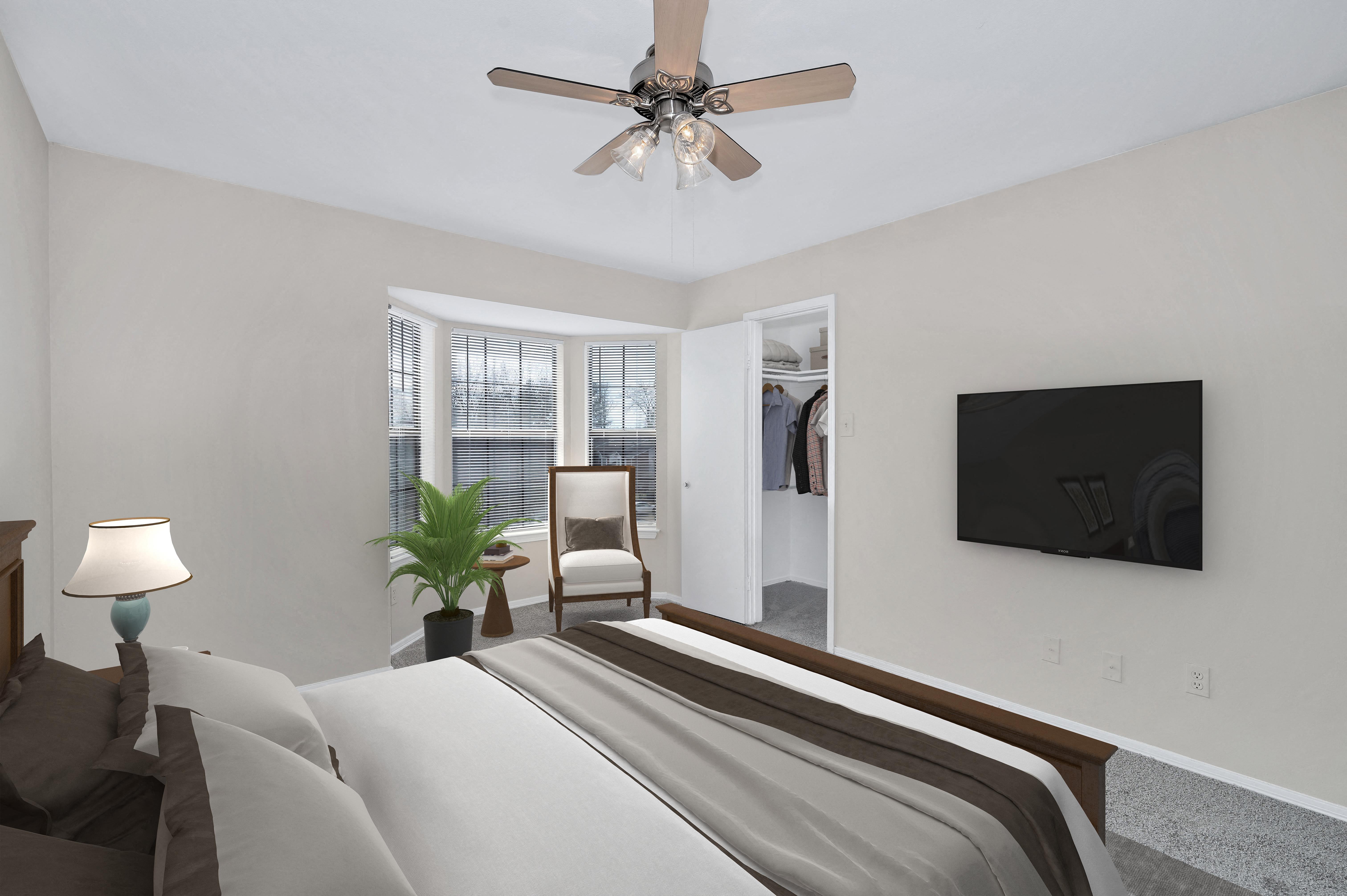 Spacious bedrooms with large windows for natural light Spacious bedrooms with large windows for natural light
