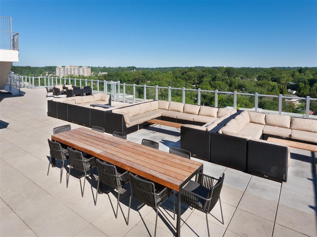 Rooftop Deck Features Sparkling Pool & Sundeck, a Tennis Court, Lounge Seating and Outdoor Games Rooftop Deck Features Sparkling Pool & Sundeck, a Tennis Court, Lounge Seating and Outdoor Games