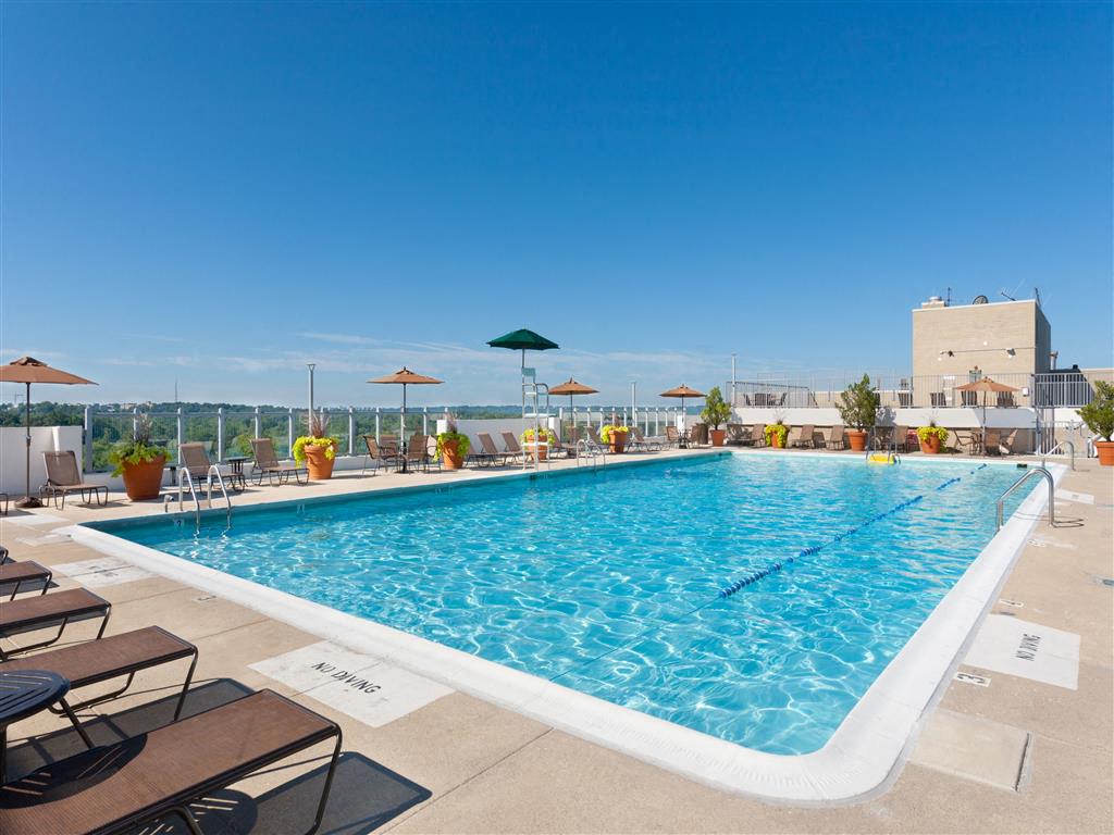 Rooftop Deck Features Sparkling Pool & Sundeck, a Tennis Court, Lounge Seating and Outdoor Games Rooftop Deck Features Sparkling Pool & Sundeck, a Tennis Court, Lounge Seating and Outdoor Games