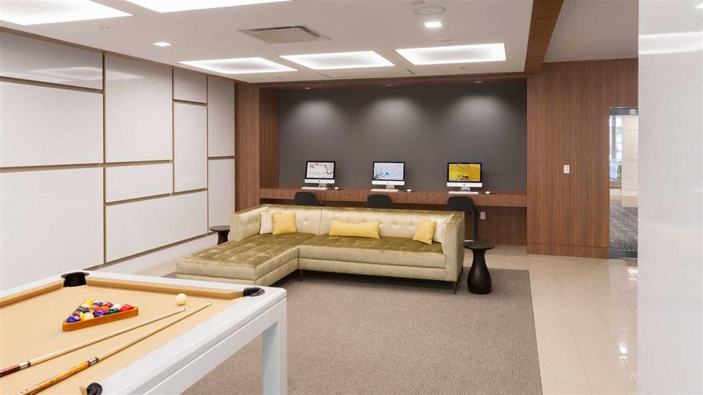 Clubroom with Lounge Seating, Kitchen, Billiards Table and Apple Computers Clubroom with Lounge Seating, Kitchen, Billiards Table and Apple Computers