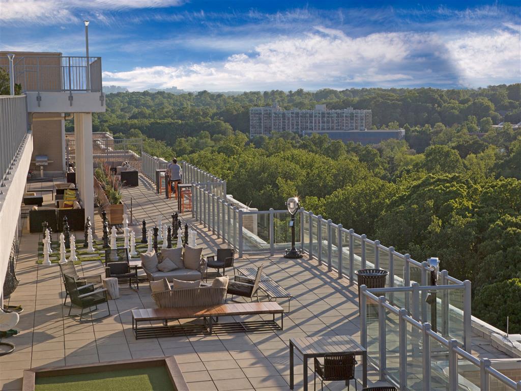 Rooftop Deck Features Sparkling Pool & Sundeck, a Tennis Court, Lounge Seating and Outdoor Games Rooftop Deck Features Sparkling Pool & Sundeck, a Tennis Court, Lounge Seating and Outdoor Games