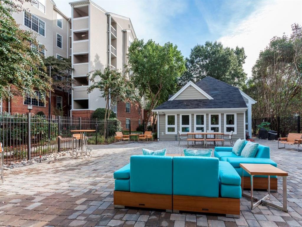 Beautifully Landscaped Courtyards with Plush Seatingl