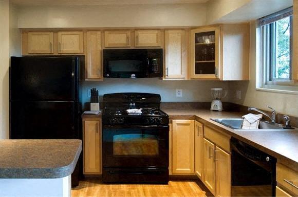 Kitchens with Modern Appliances including Dishwasher, Garbage Disposal, and Microwave