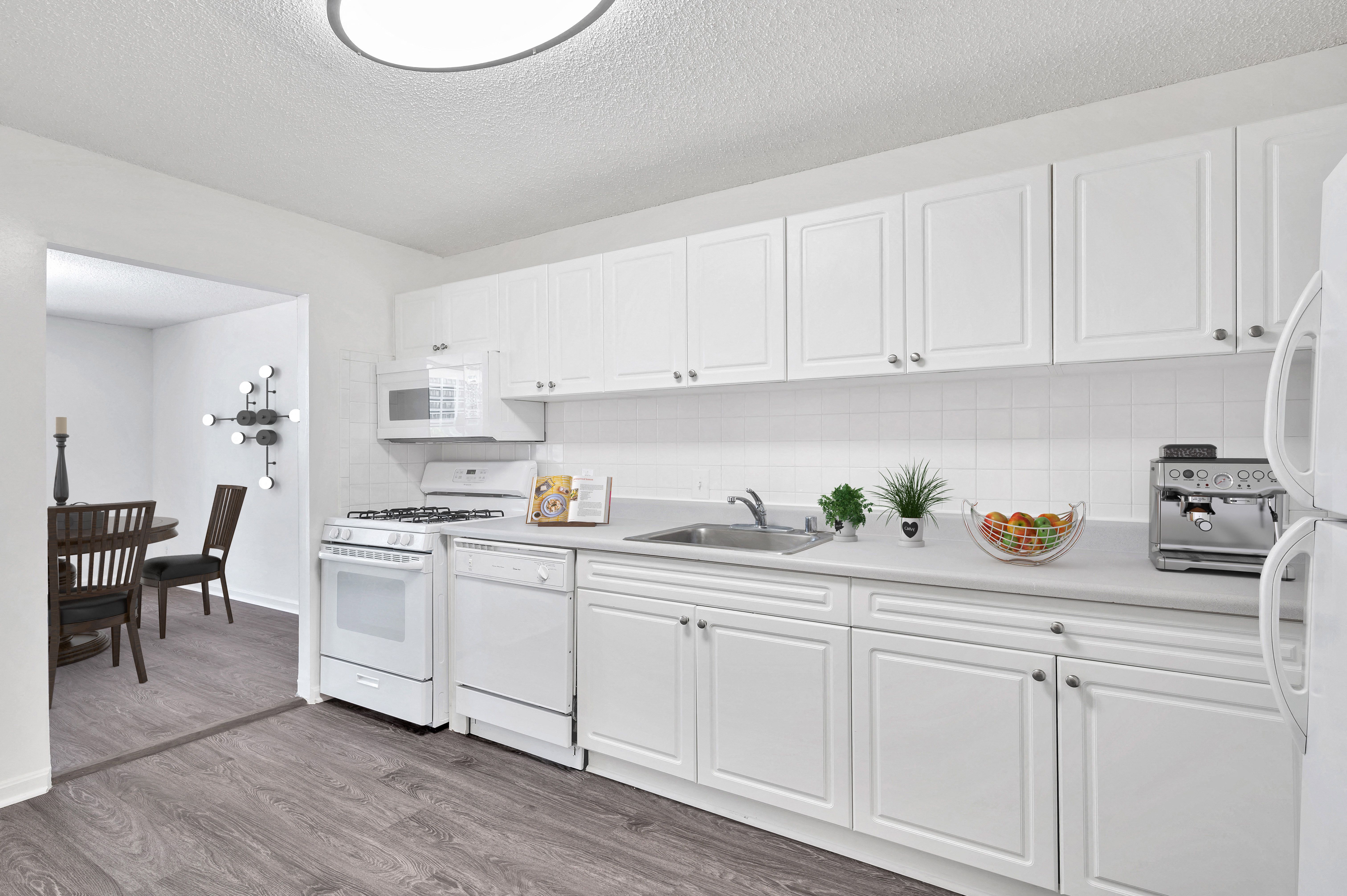 Spacious kitchens with white cabinetry