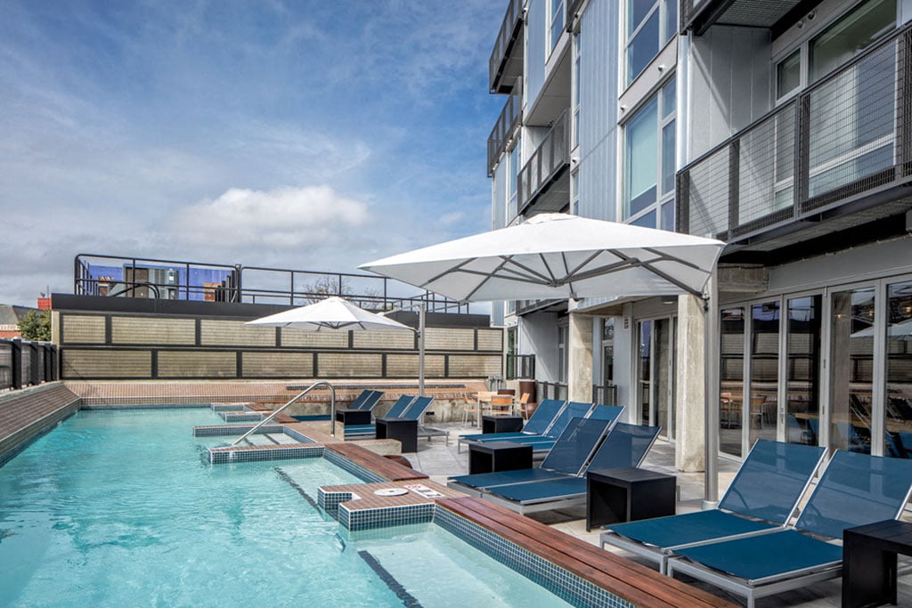 Heated, Year-Round Pool with Sundeck, Lounge Chairs, and Umbrellas 
