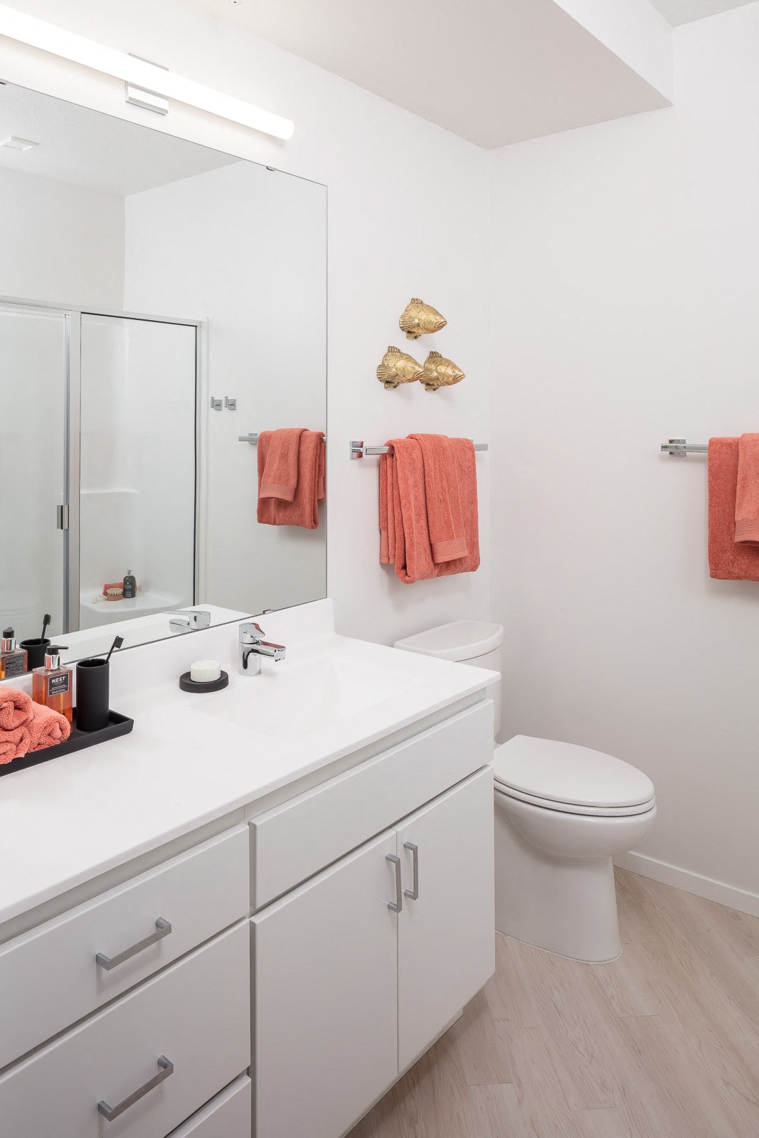 Bathrooms feature upgraded fixtures and finishes