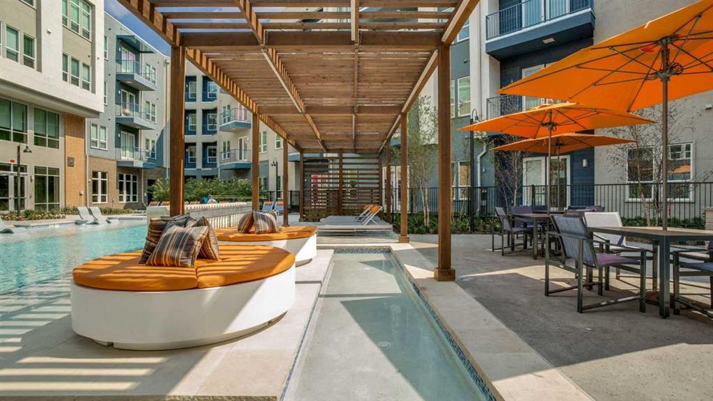 Serene pool with private cabanas.