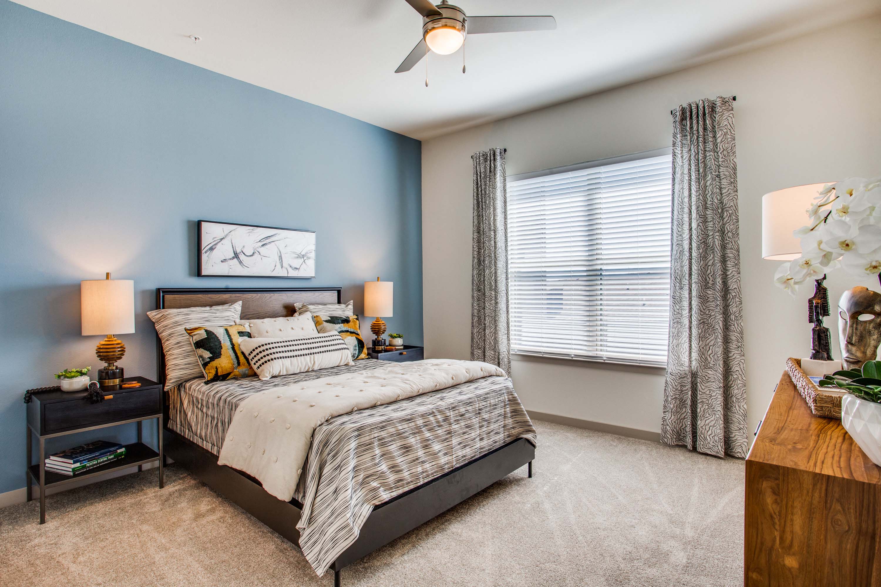 Primary bedroom with ceiling fan