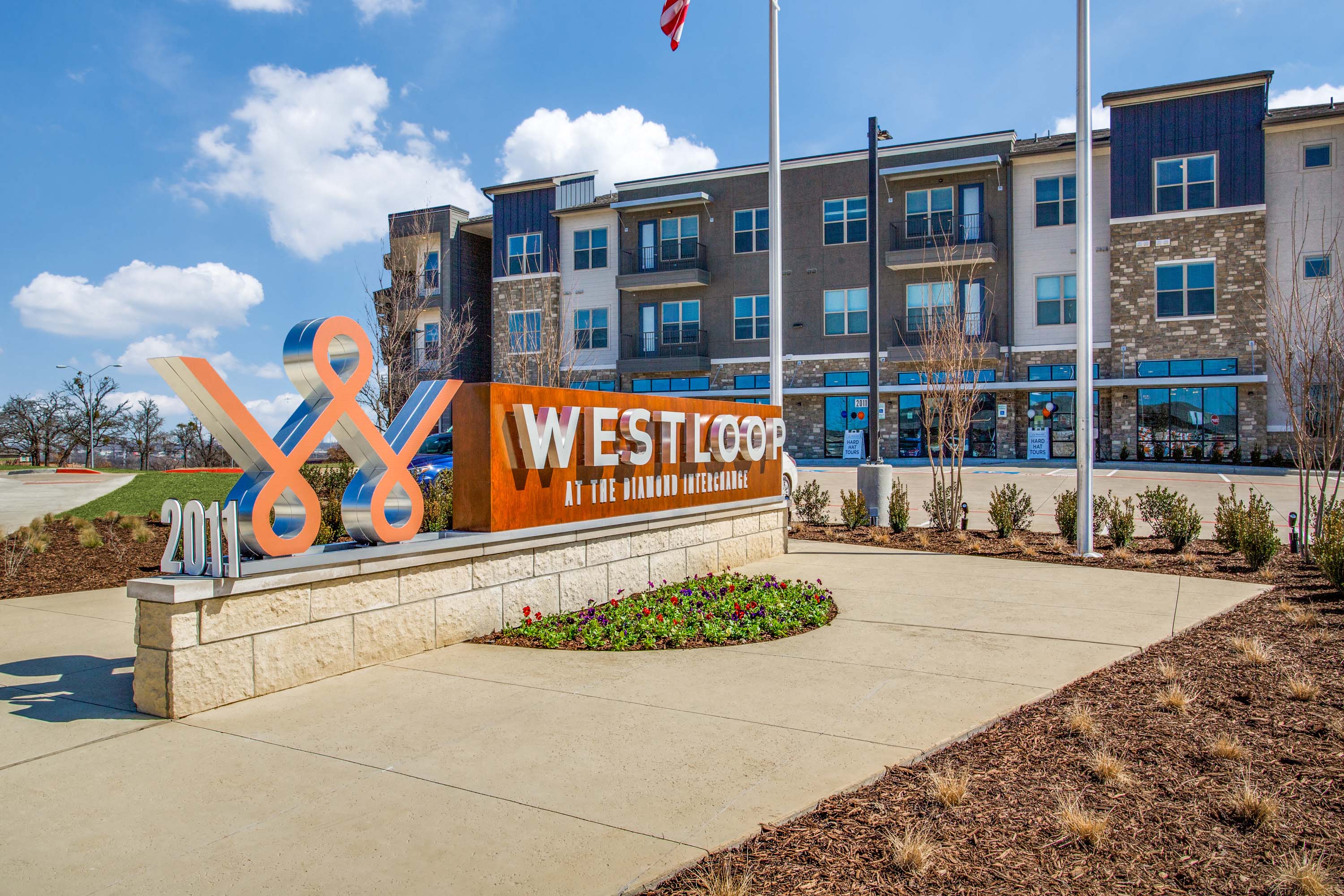 Westloop community entrance sign