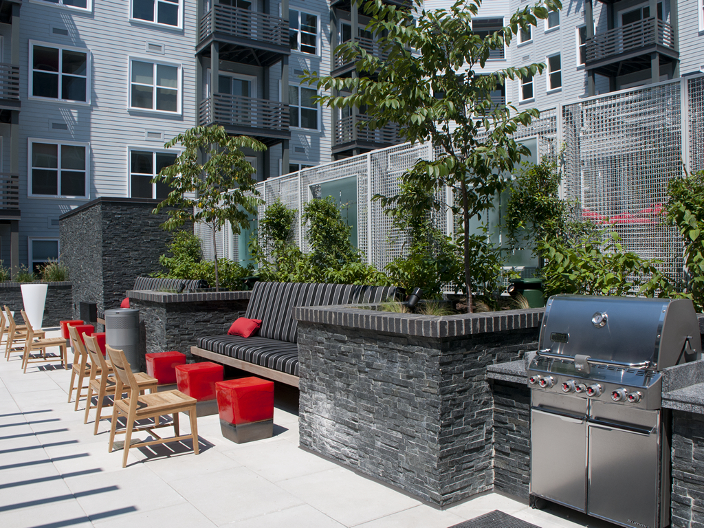 GATHER courtyard with outdoor kitchen and grilling stations