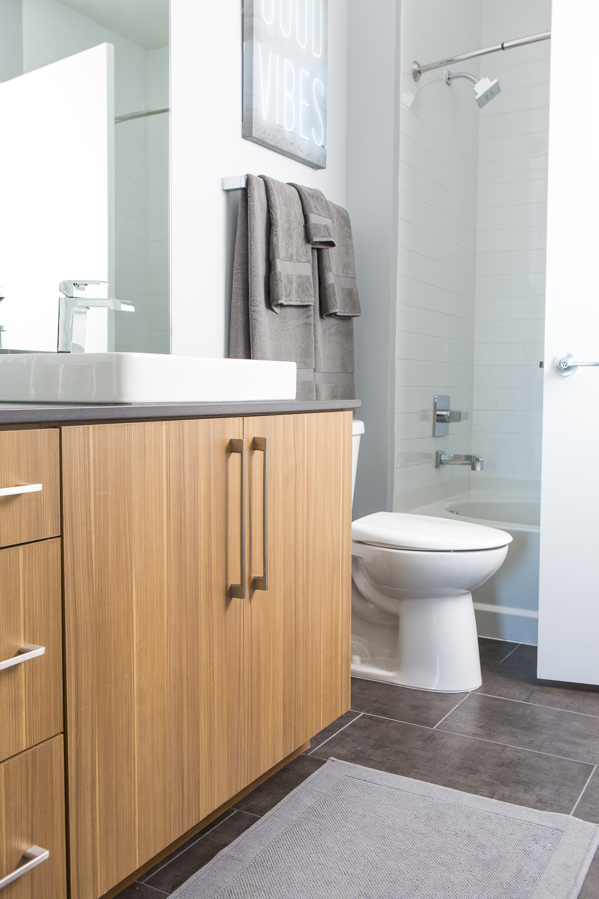 Bathrooms feature contemporary fixtures and finishes