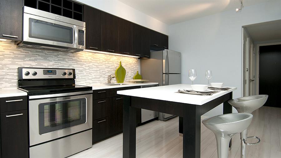Gourmet kitchen with upgraded stainless steel appliances Gourmet kitchen with upgraded stainless steel appliances