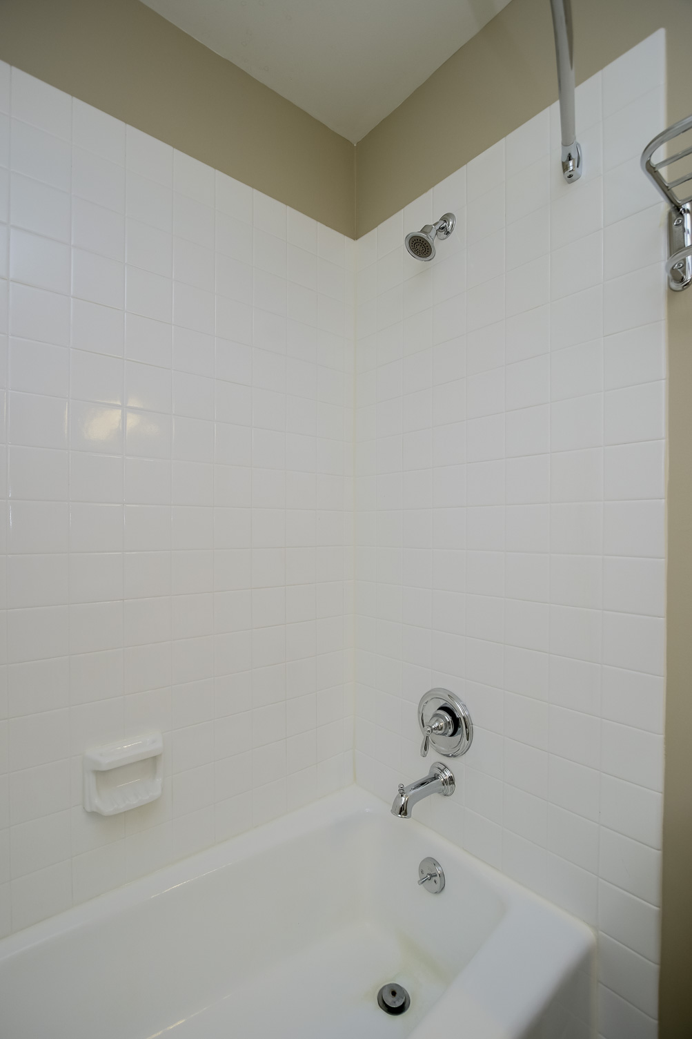 Large Soaking Tub In Master Bathroom with A Tile Surround