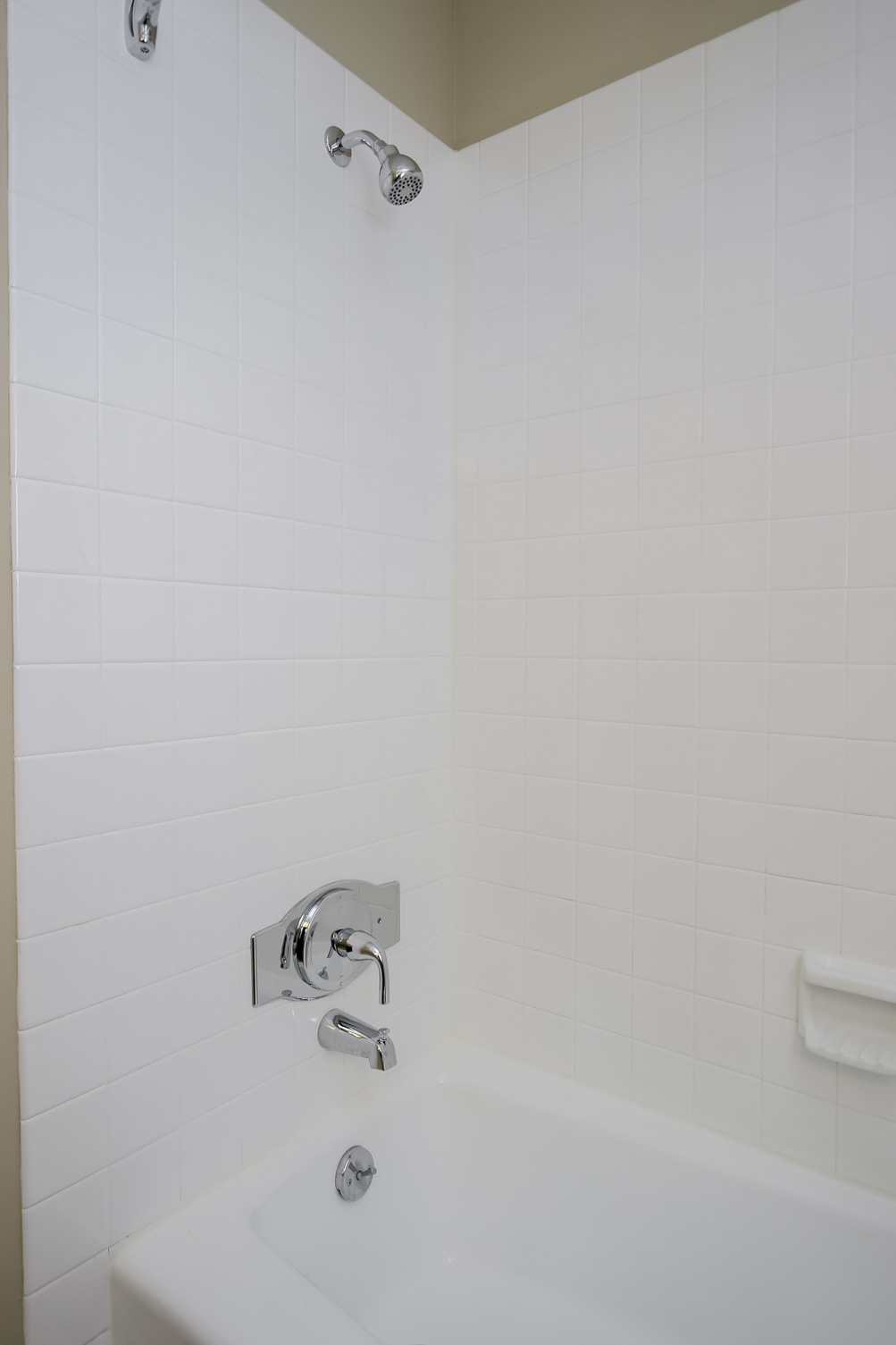 Large Soaking Tub In Master Bathroom with A Tile Surround
