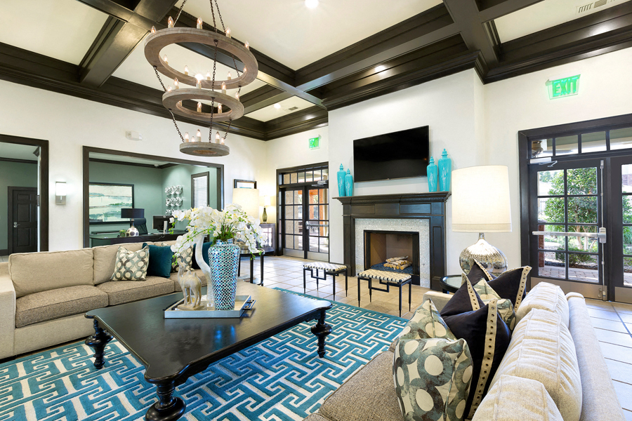 Community Lounge with chandelier and fire place
