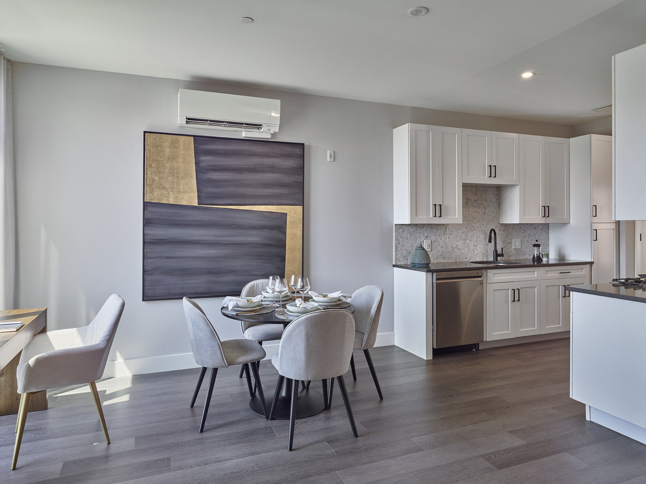 Large one bedroom with hardwood flooring and chef-inspired kitchen