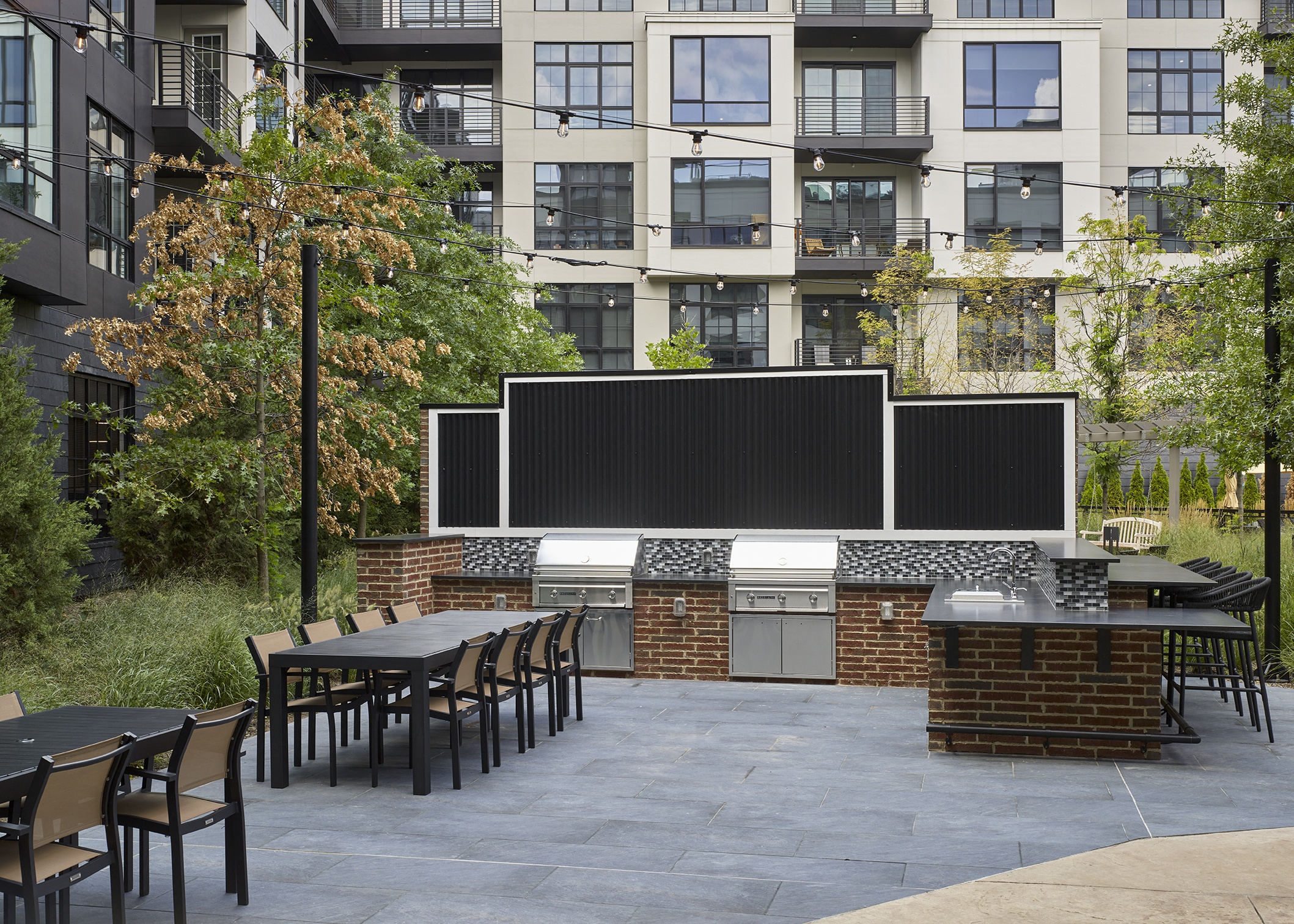 outdoor barbecue, grills, outdoor dining area