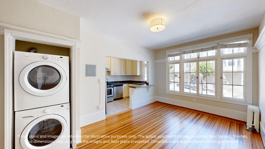A white washer and dryer are in a laundry room.