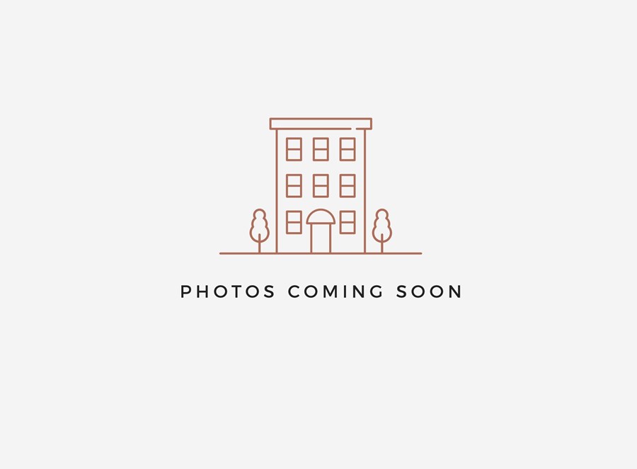 A placeholder image with a building and two people.