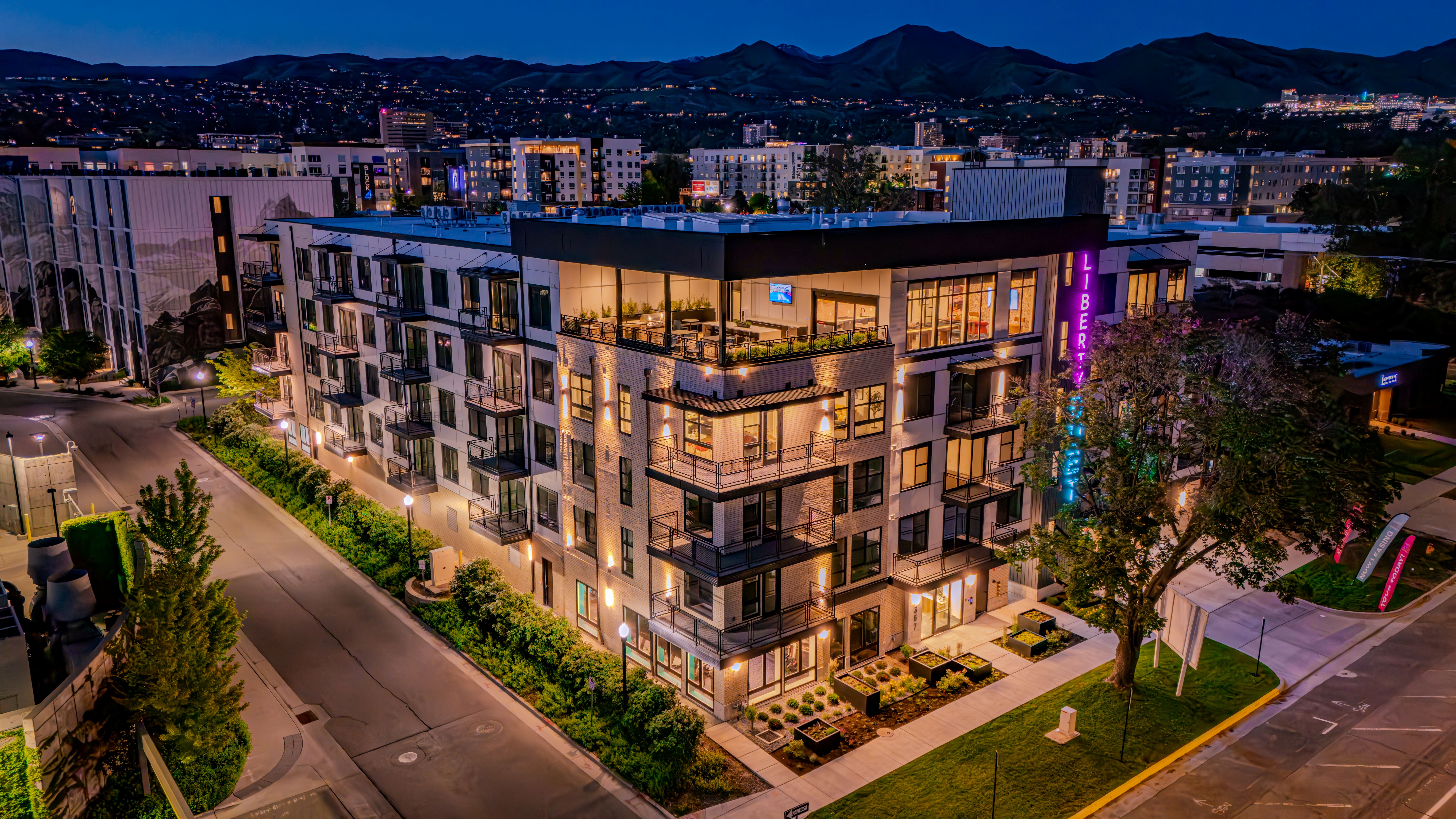 Liberty Duet Apartments, Salt Lake City, Utah; exterior well-lit front at night.