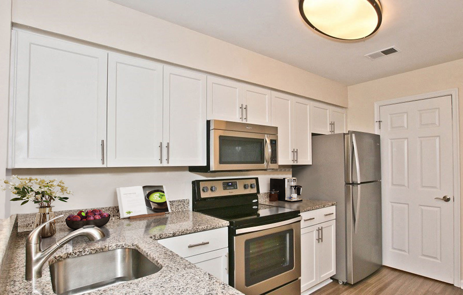 Renovated kitchen featuring stainless steel appliances