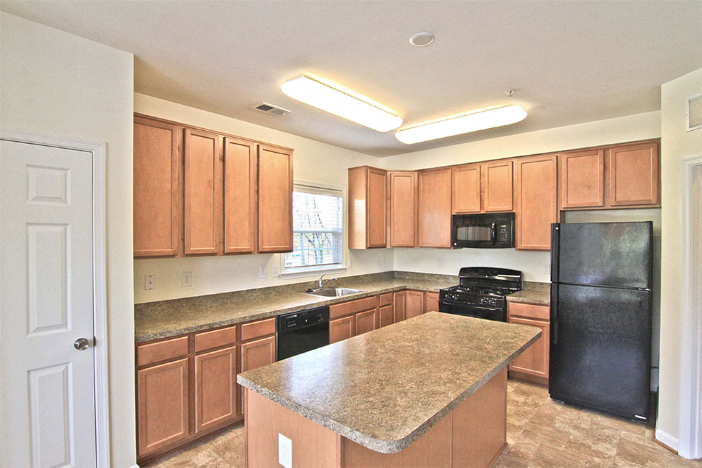 View of kitchen in townhome floorplan at Barrington Park
