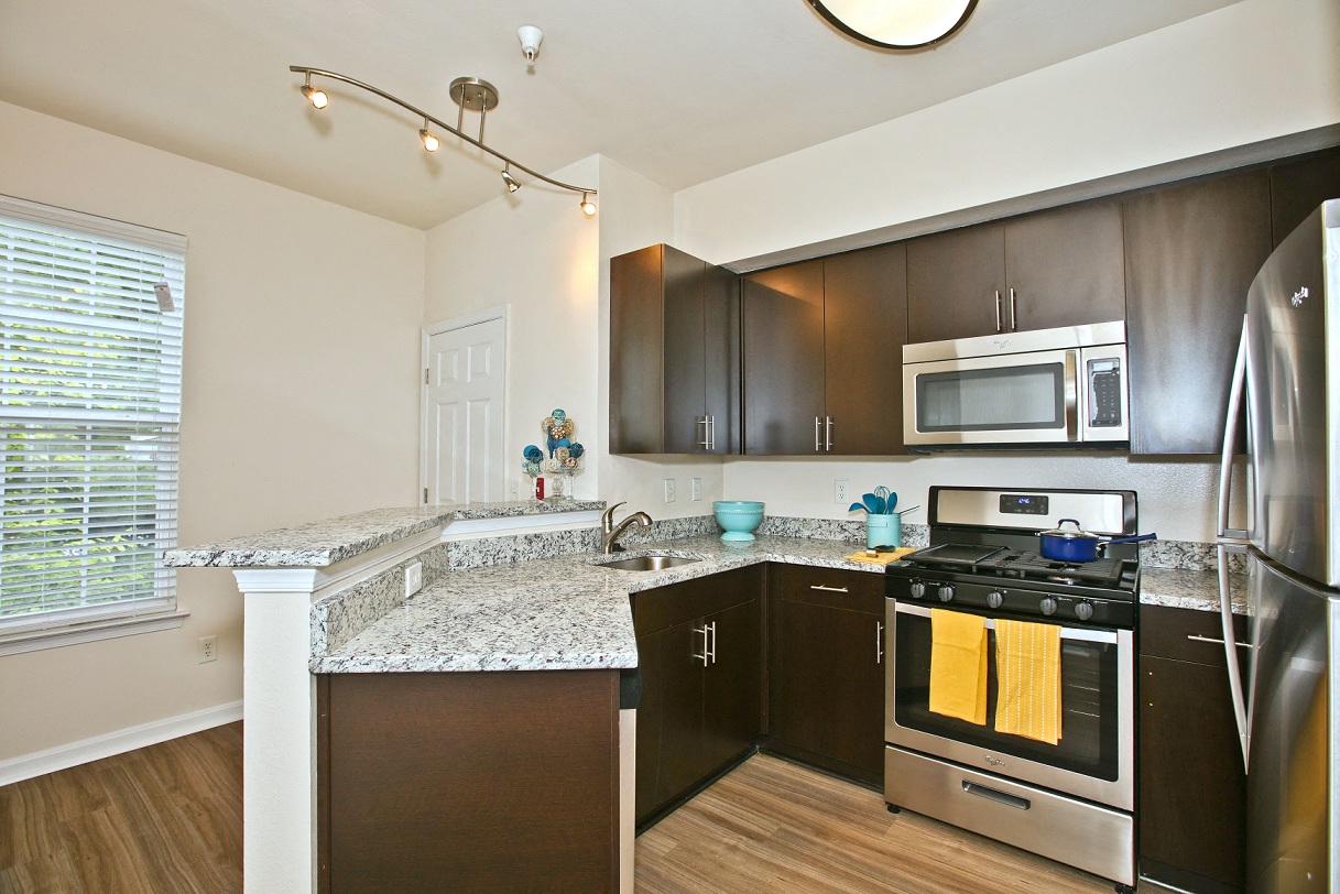 Renovated Kitchens featuring Stainless Steel Smart Appliances at Broadlands