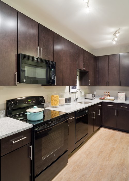 Large kitchen with pantry, island and granite countertops