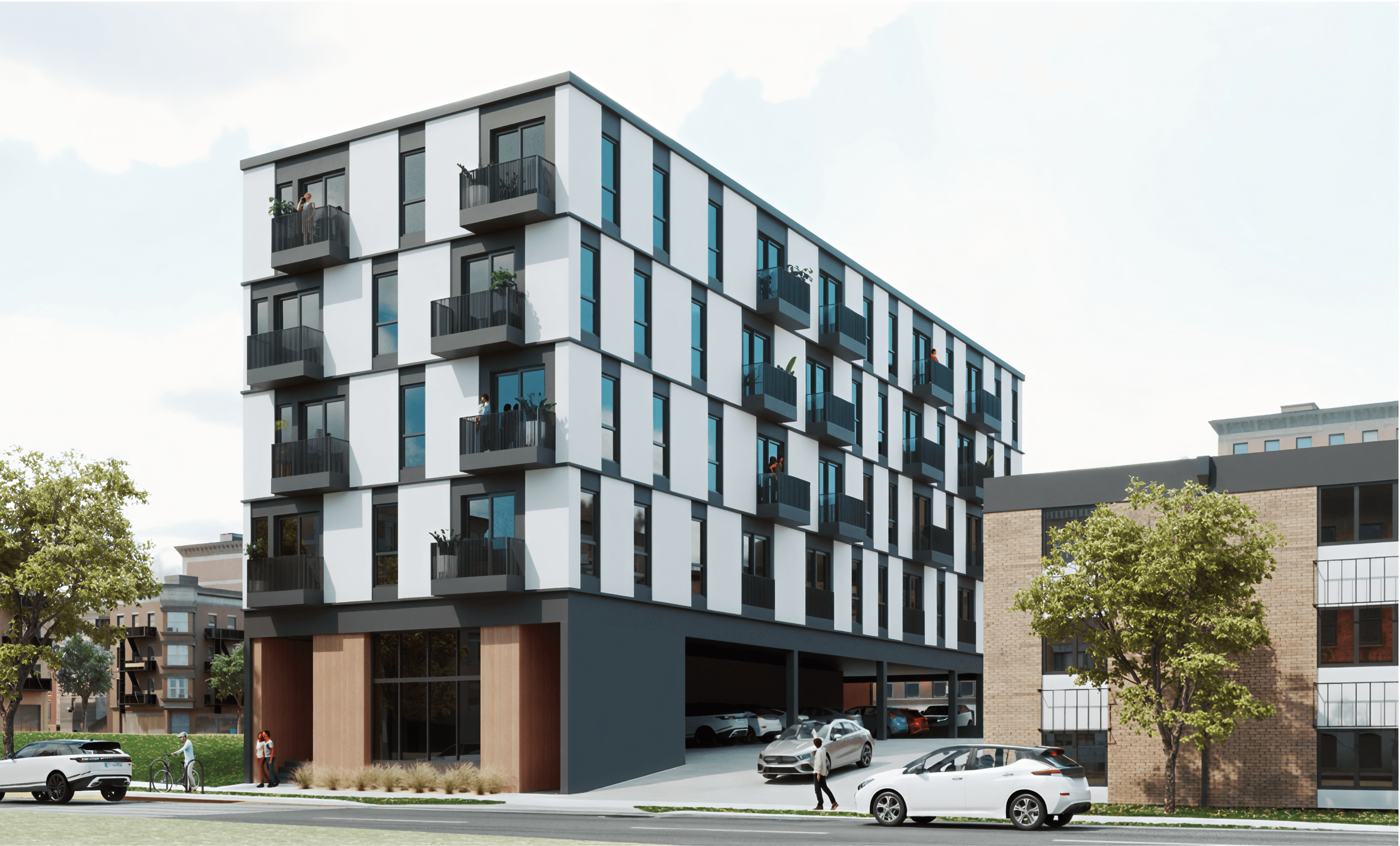A modern building with a black and white facade and balconies.