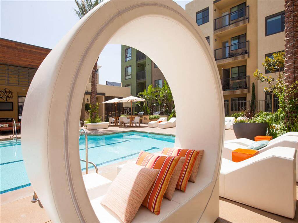 A poolside lounger in the courtyard of the Terrana Apartment Homes in Northridge, California.