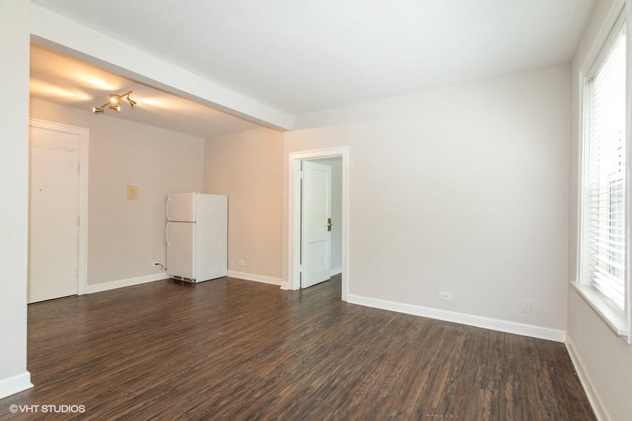 renovated living room in hyde park chicago apartment hardwood floors